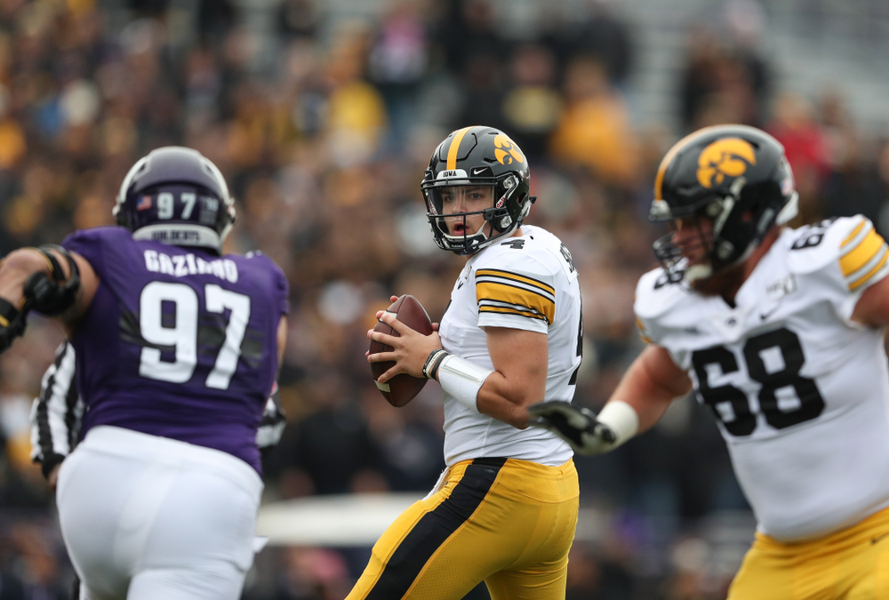 Iowa Hawkeyes quarterback Nate Stanley (4) against the Northwestern Wildcats Saturday, October 26, 2019 at Ryan Field in Evanston, Ill. (Brian Ray/hawkeyesports.com)