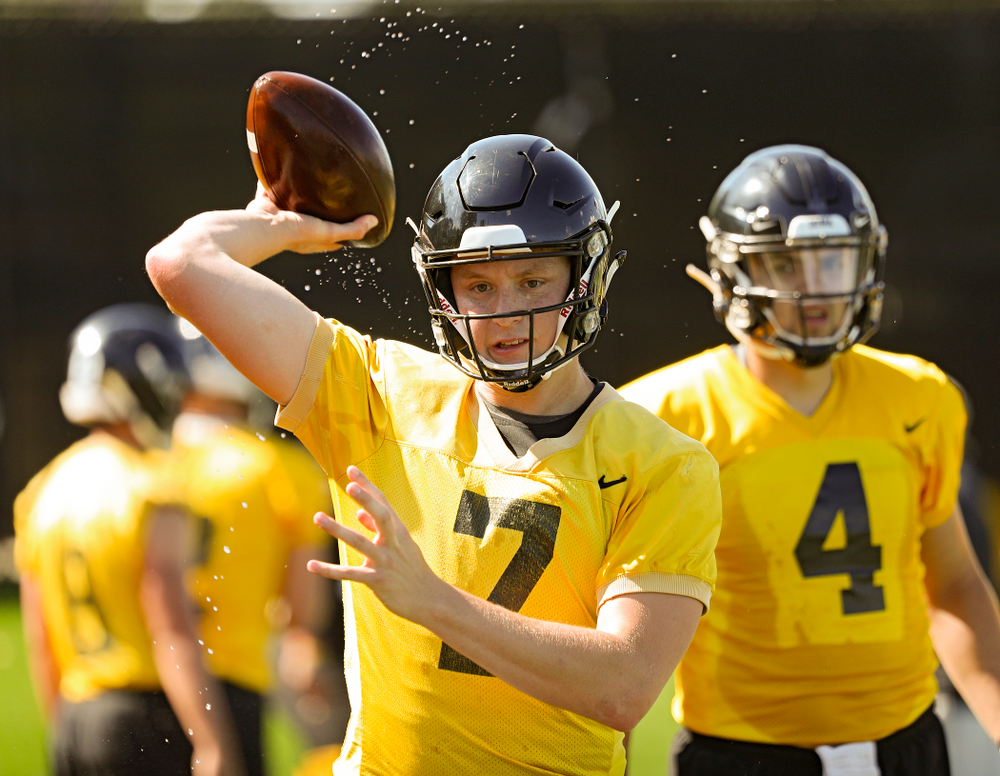Iowa Hawkeyes quarterback Spencer Petras (7) throws a wet football as they run a drill during Fall Camp Practice No. 13 at the Hansen Football Performance Center in Iowa City on Friday, Aug 16, 2019. (Stephen Mally/hawkeyesports.com)