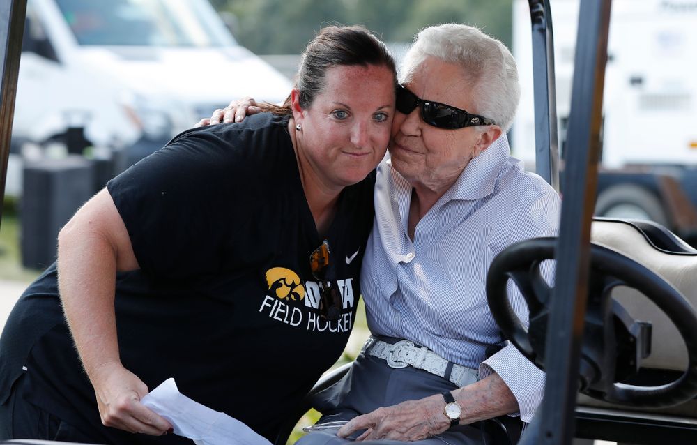 Dr. Christine Grant hugs head coach Lisa Cellucci during an alumni reunion Sunday, September 16, 2018 at Grant Field. (Brian Ray/hawkeyesports.com)