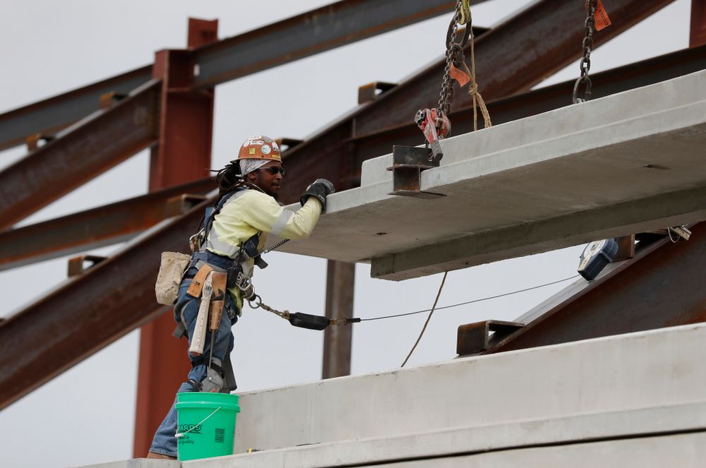 A section of precast concrete is lifted into place on the third deck of the north end zone Wednesday, June 6, 2018 at Kinnick Stadium. (Brian Ray/hawkeyesports.com)