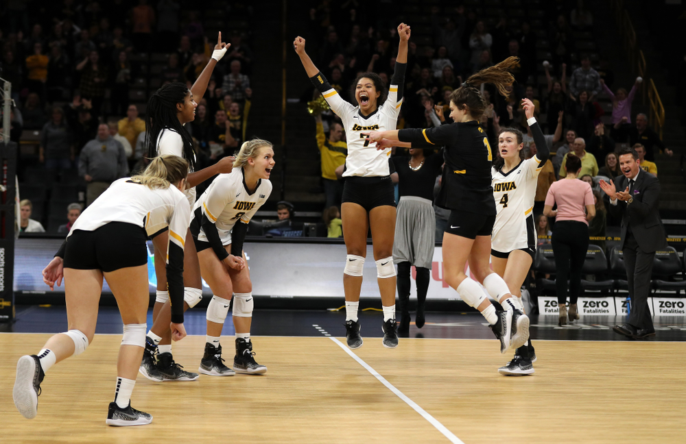 The Iowa Hawkeyes celebrate match point in the 5th game against the Ohio State Buckeyes Saturday, November 24, 2018 at Carver-Hawkeye Arena. (Brian Ray/hawkeyesports.com)