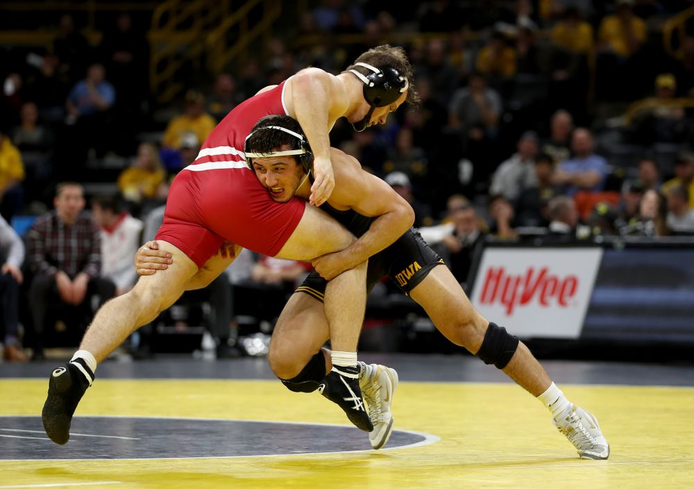 IowaÕs Michael Kemerer wrestles WisconsinÕs Jared Krattinger at 174 pounds Sunday, December 1, 2019 at Carver-Hawkeye Arena. Kemerer won the match with a fall. (Brian Ray/hawkeyesports.com)