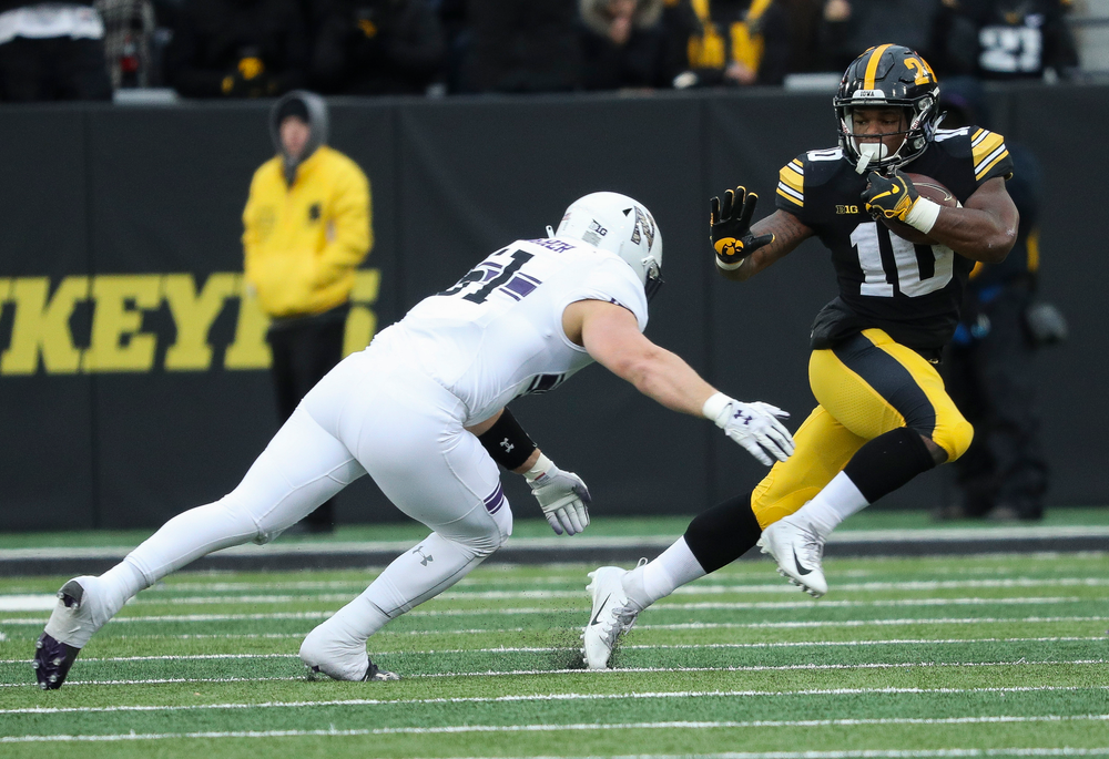 Iowa Hawkeyes running back Mekhi Sargent (10) runs the ball during a game against Northwestern at Kinnick Stadium on November 10, 2018. (Tork Mason/hawkeyesports.com)