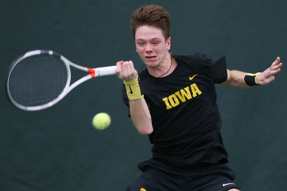 Iowa’s Jason Kerst hits a forehand during the Iowa men’s tennis meet vs VCU on Saturday, February 29, 2020 at the Hawkeye Tennis and Recreation Complex. (Lily Smith/hawkeyesports.com)
