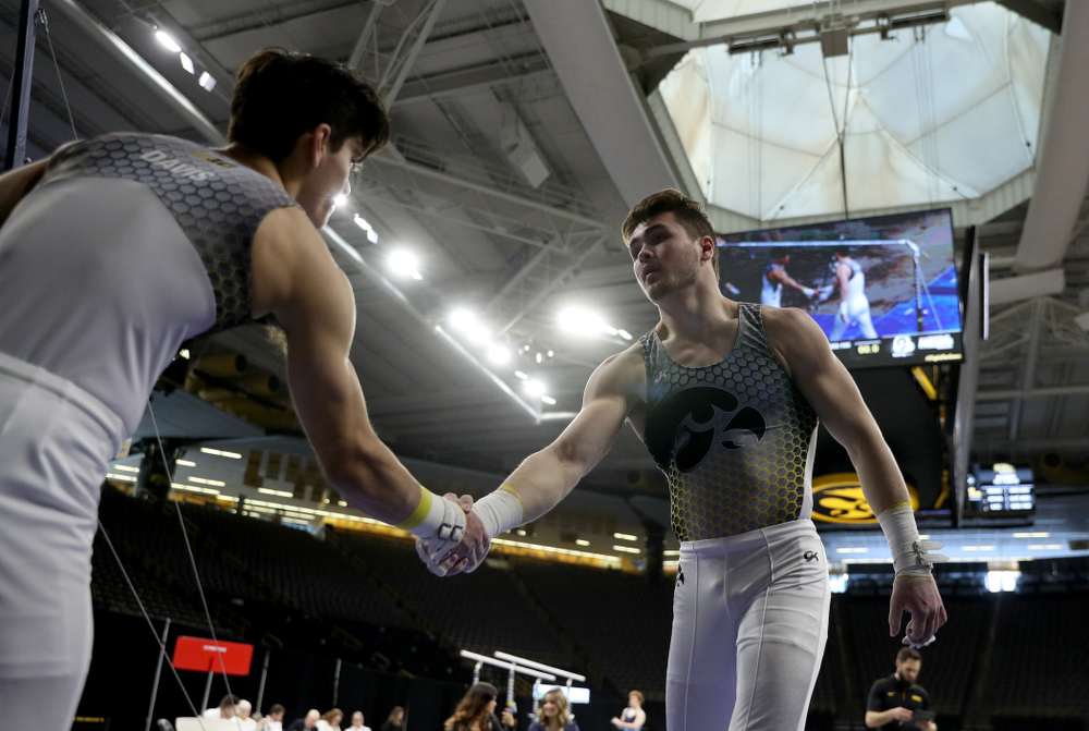 Iowa’s Alex Walther competes on the high bar against UIC and Minnesota Saturday, February 1, 2020 at Carver-Hawkeye Arena. (Brian Ray/hawkeyesports.com)
