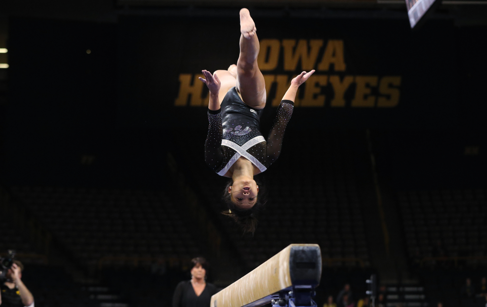 Iowa's Misty-Jade Carlson competes on the beam against the Rutgers Scarlet Knights Saturday, January 26, 2019 at Carver-Hawkeye Arena. (Brian Ray/hawkeyesports.com)
