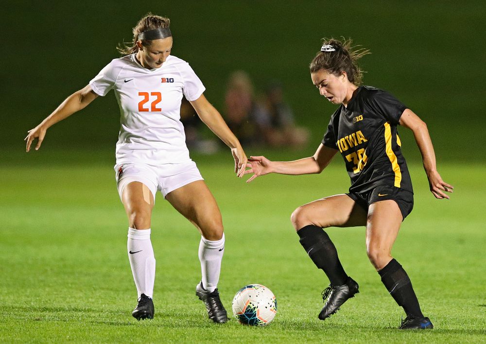 Iowa forward Devin Burns (30) battles for position on the ball during the first half of their match against Illinois at the Iowa Soccer Complex in Iowa City on Thursday, Sep 26, 2019. (Stephen Mally/hawkeyesports.com)