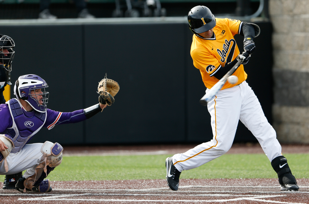 Iowa Hawkeyes infielder Kyle Crowl (23) swings at a pitch during a game against Evansville at Duane Banks Field on March 18, 2018. (Tork Mason/hawkeyesports.com)