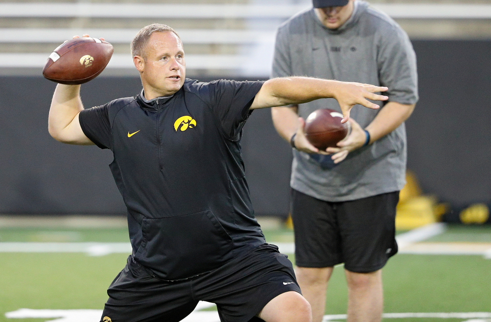 Iowa Hawkeyes linebackers coach Seth Wallace throws a pass during Fall Camp Practice No. 12 at Kinnick Stadium in Iowa City on Thursday, Aug 15, 2019. (Stephen Mally/hawkeyesports.com)