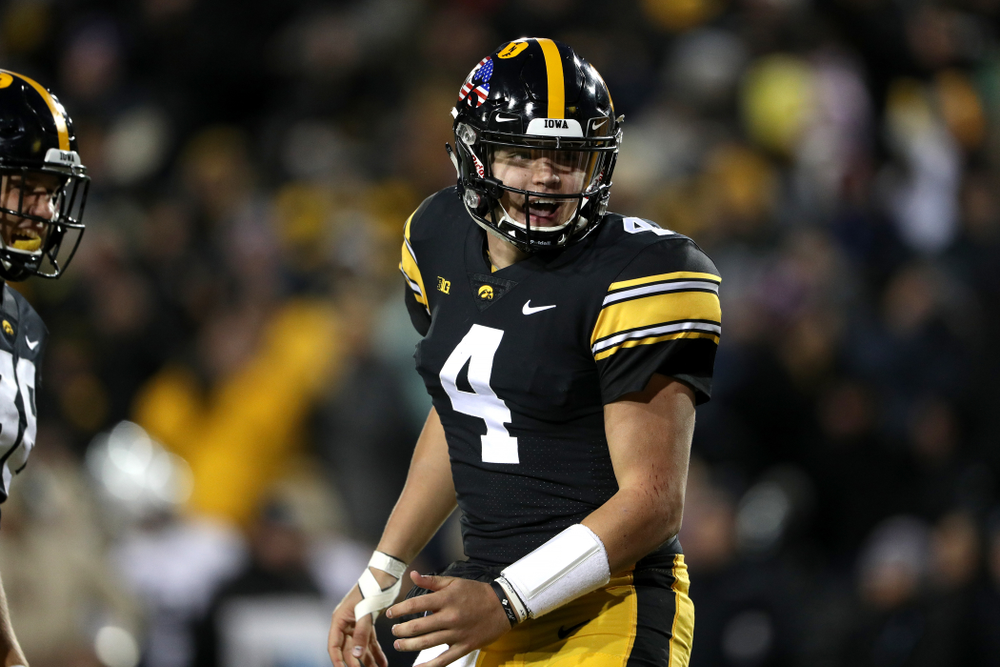 Iowa Hawkeyes quarterback Nate Stanley (4) celebrates a touchdown against the Northwestern Wildcats Saturday, November 10, 2018 at Kinnick Stadium. (Brian Ray/hawkeyesports.com)