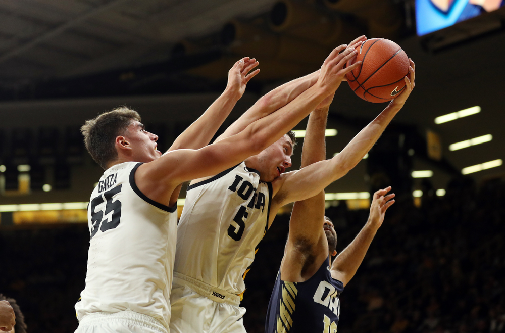 Iowa Hawkeyes guard CJ Fredrick (5) and forward Luka Garza (55) against Oral Roberts Friday, November 15, 2019 at Carver-Hawkeye Arena. (Brian Ray/hawkeyesports.com)