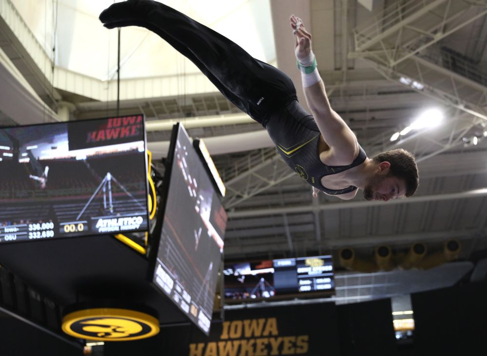 Iowa's Rogelio Vazquez competes on the high bar against the Ohio State Buckeyes Saturday, March 16, 2019 at Carver-Hawkeye Arena. (Brian Ray/hawkeyesports.com)