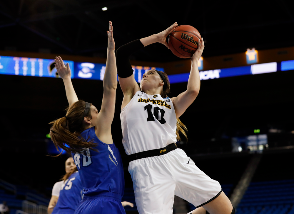 Iowa Hawkeyes forward Megan Gustafson (10) goes to the hoop against the Creighton Bluejays in the first round of the 2018 NCAA Women's Basketball Tournament Saturday, March 17, 2018 at Pauley Pavilion on the campus of UCLA. (Brian Ray/hawkeyesports.com)