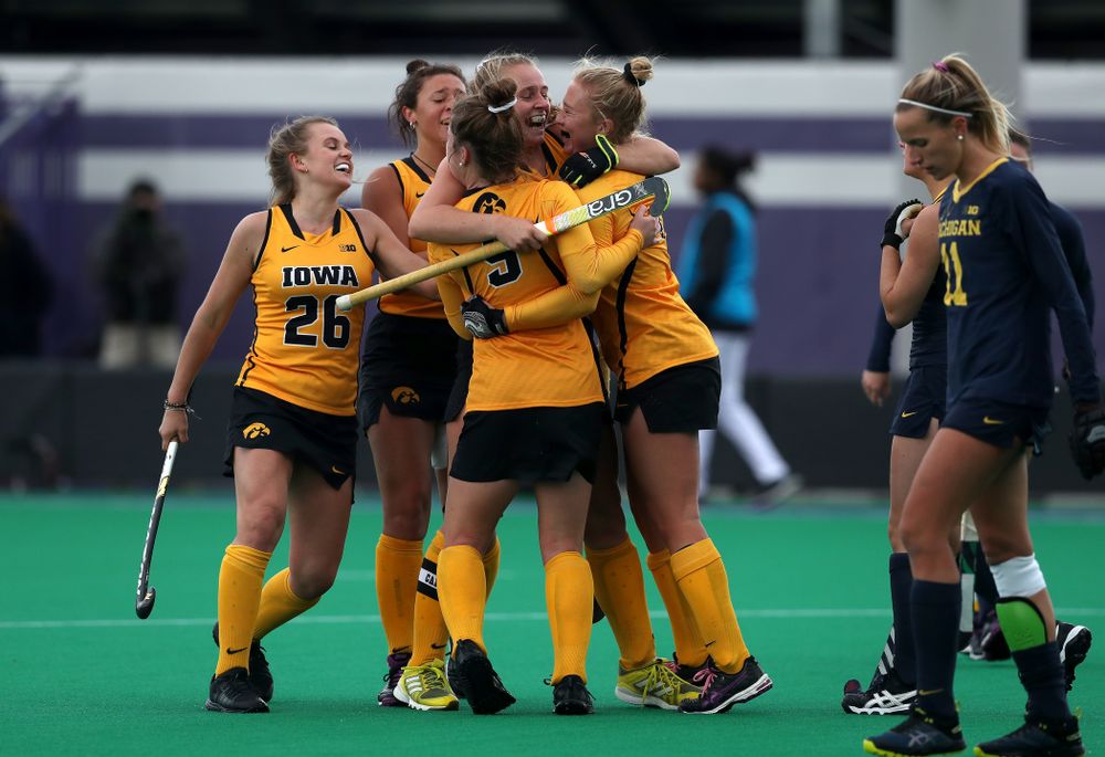 Iowa Hawkeyes Katie Birch (11) and Makenna Grewe (4) celebrate the game winning goal against the Michigan Wolverines in the semi-finals of the Big Ten Tournament Friday, November 2, 2018 at Lakeside Field on the campus of Northwestern University in Evanston, Ill. (Brian Ray/hawkeyesports.com)