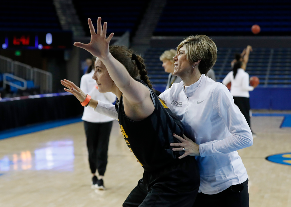 Iowa Hawkeyes forward Megan Gustafson (10) works against associate head coach Jan Jensen during practice Friday, March 16, 2018 at Pauley Pavilion on the campus of UCLA. (Brian Ray/hawkeyesports.com)