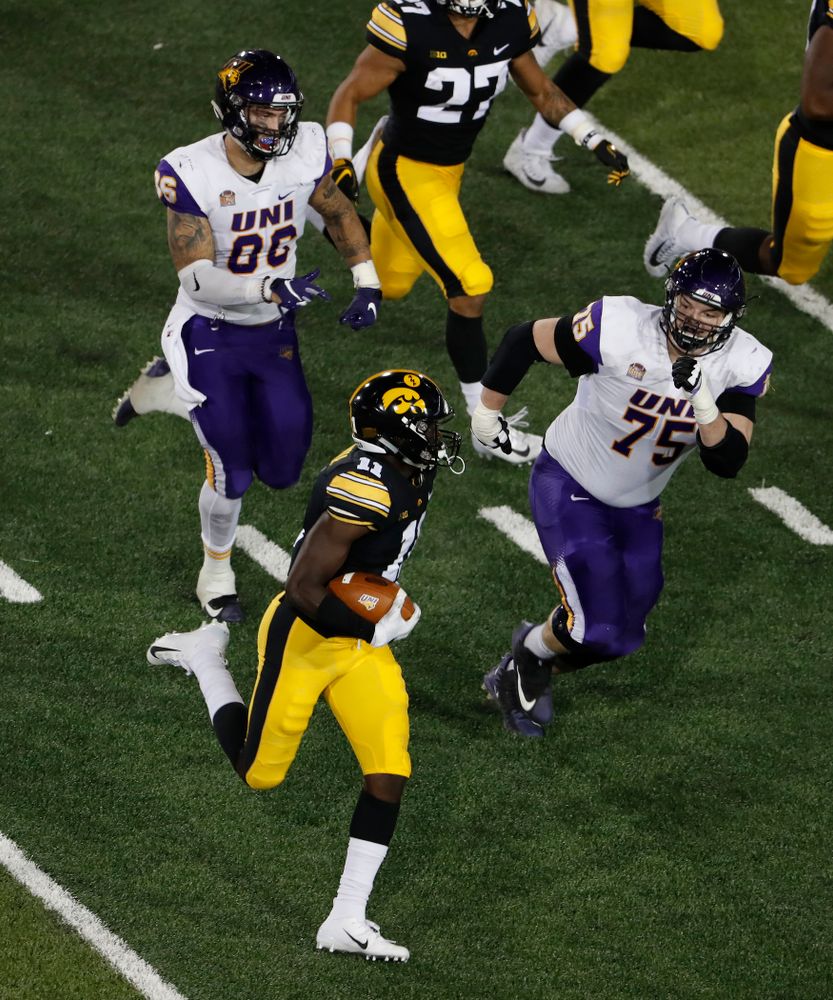 Iowa Hawkeyes defensive back Michael Ojemudia (11) returns an interception against the Northern Iowa Panthers Saturday, September 15, 2018 at Kinnick Stadium. (Brian Ray/hawkeyesports.com)
