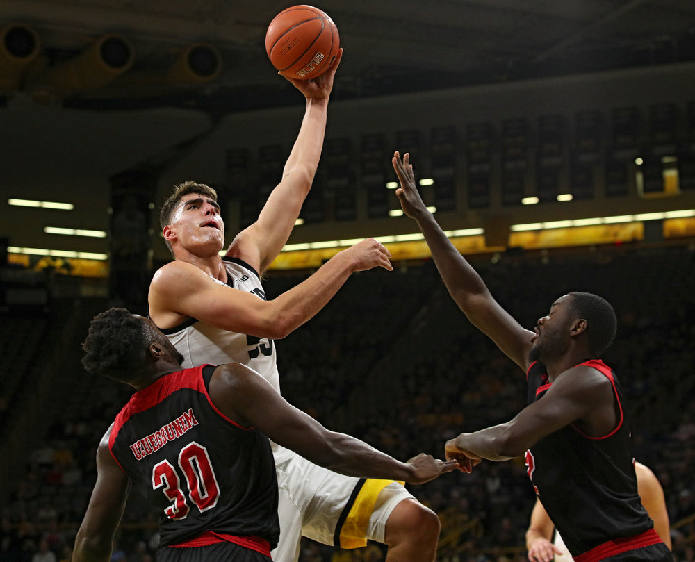 Iowa Hawkeyes center Luka Garza (55) puts up a shot during the first half of their game at Carver-Hawkeye Arena in Iowa City on Friday, Nov 8, 2019. (Stephen Mally/hawkeyesports.com)