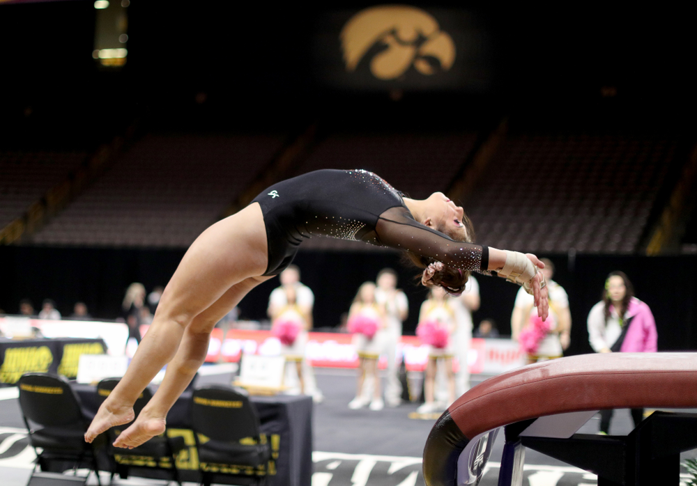 Iowa’s Ariana Agrapides competes on the vault against Michigan Friday, February 14, 2020 at Carver-Hawkeye Arena. (Brian Ray/hawkeyesports.com)
