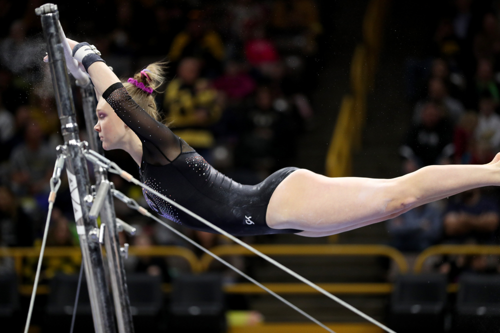 Iowa’s Allyson Steffensmeier competes on the bars against Michigan Friday, February 14, 2020 at Carver-Hawkeye Arena. (Brian Ray/hawkeyesports.com)