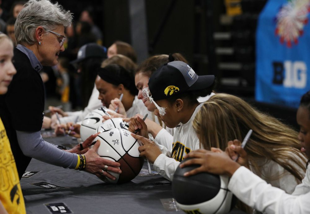 Iowa Hawkeyes guard Tania Davis (11) during a celebration of their Big Ten Women's Basketball Tournament championship Monday, March 18, 2019 at Carver-Hawkeye Arena. (Brian Ray/hawkeyesports.com)