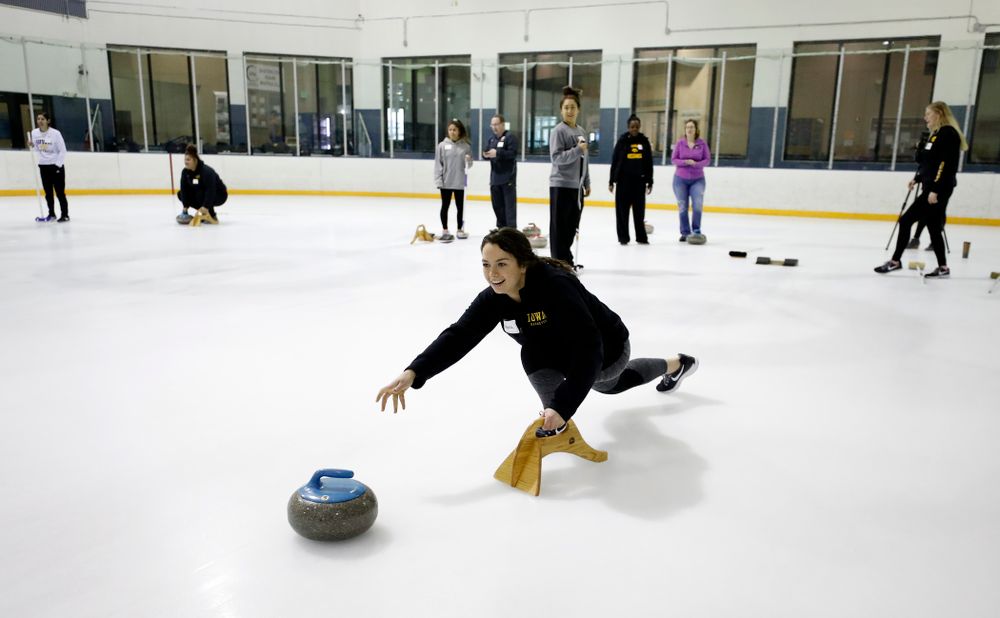 Members of the Iowa Softball team learn the sport of curling as part of a team building event Wednesday, January 10, 2018 at the Cedar Rapids Ice Arena. (Brian Ray/hawkeyesports.com)