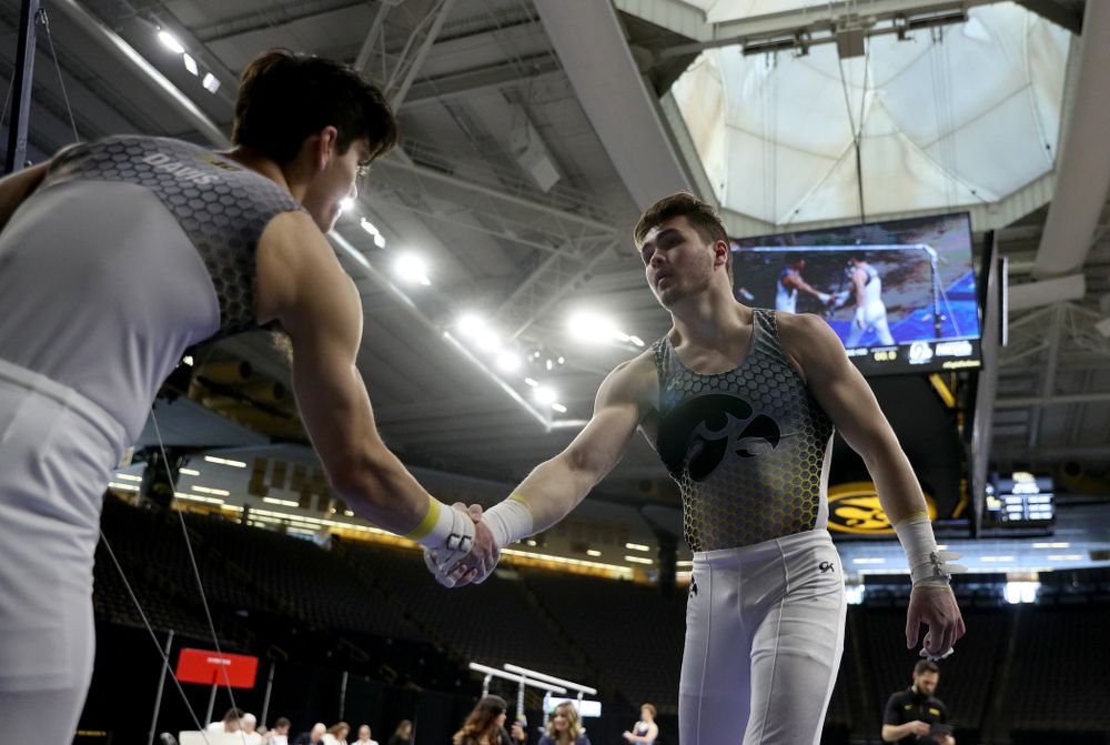 Iowa’s Alex Walther competes on the high bar against UIC and Minnesota Saturday, February 1, 2020 at Carver-Hawkeye Arena. (Brian Ray/hawkeyesports.com)