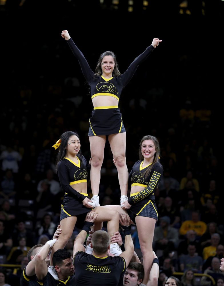 The Iowa Cheerleaders and Dance Team perform on senior night at half-time of the Iowa Hawkeyes game against the Purdue Boilermakers Tuesday, March 3, 2020 at Carver-Hawkeye Arena. (Brian Ray/hawkeyesports.com)