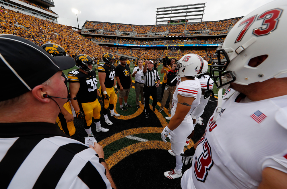 Captains Jake Gervase, Nate Stanley, Brady Ross, Parker Hesse, and Honorary Captain Julian Vandervelde against the Norther Illinois Huskies Saturday, September 1, 2018 . (Brian Ray/hawkeyesports.com)