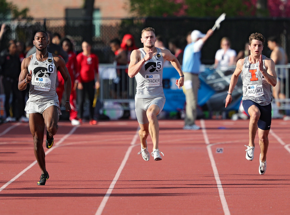 Iowa's Antonio Woodard and Collin Hofacker runs the men’s 200 meter dash event on the first day of the Big Ten Outdoor Track and Field Championships at Francis X. Cretzmeyer Track in Iowa City on Friday, May. 10, 2019. (Stephen Mally/hawkeyesports.com)