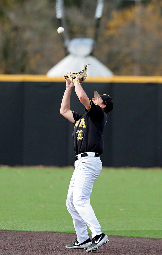 Iowa’s Sam Link (3) pulls in a pop up during the second inning of the first game of the Black and Gold Fall World Series at Duane Banks Field in Iowa City on Tuesday, Oct 15, 2019. (Stephen Mally/hawkeyesports.com)