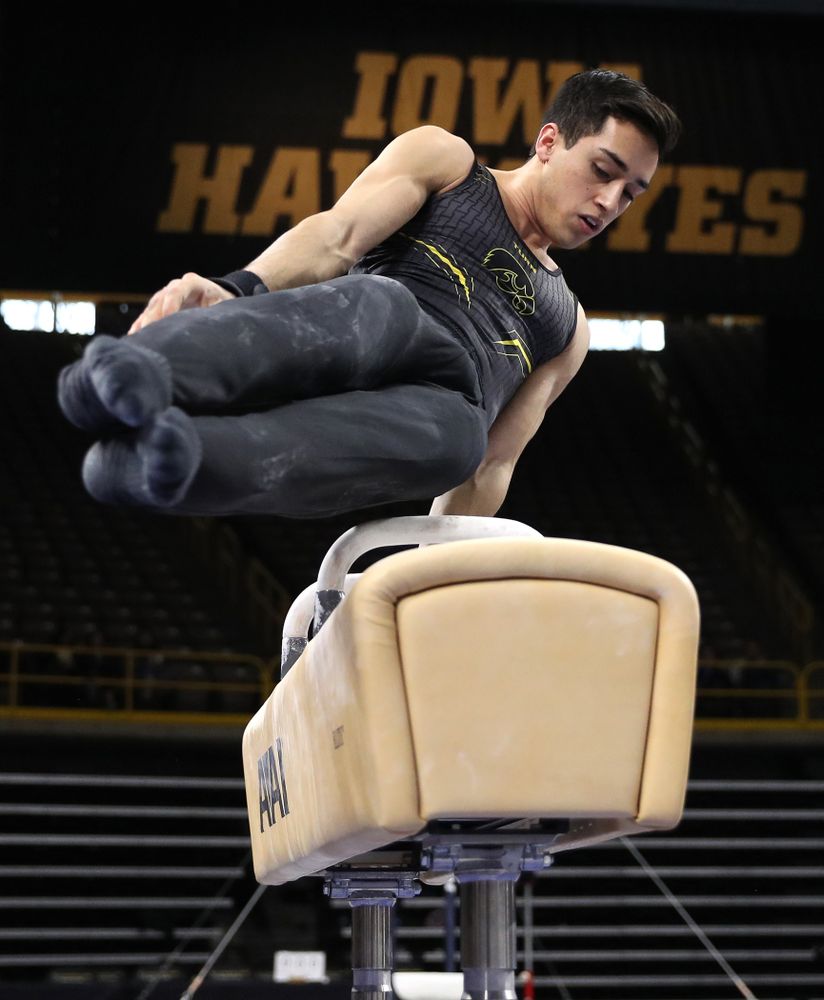 Iowa's Andrew Herrador competes on the Pommel Horse against Oklahoma Saturday, February 9, 2019 at Carver-Hawkeye Arena. (Brian Ray/hawkeyesports.com)