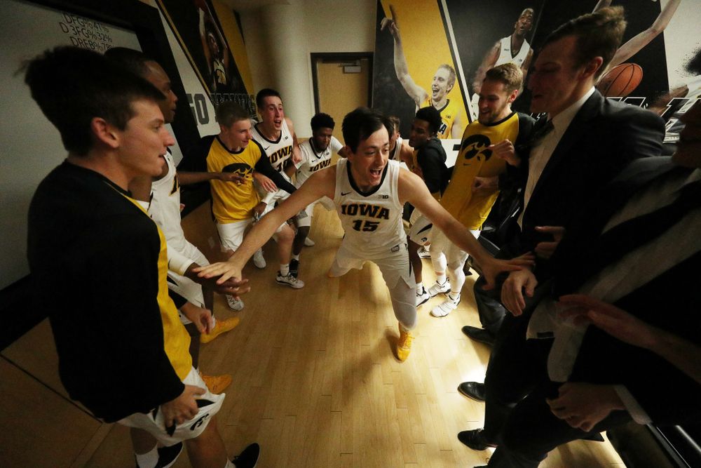 Iowa Hawkeyes forward Ryan Kriener (15) celebrates their victory against the Pitt Panthers Tuesday, November 27, 2018 at Carver-Hawkeye Arena. (Brian Ray/hawkeyesports.com)