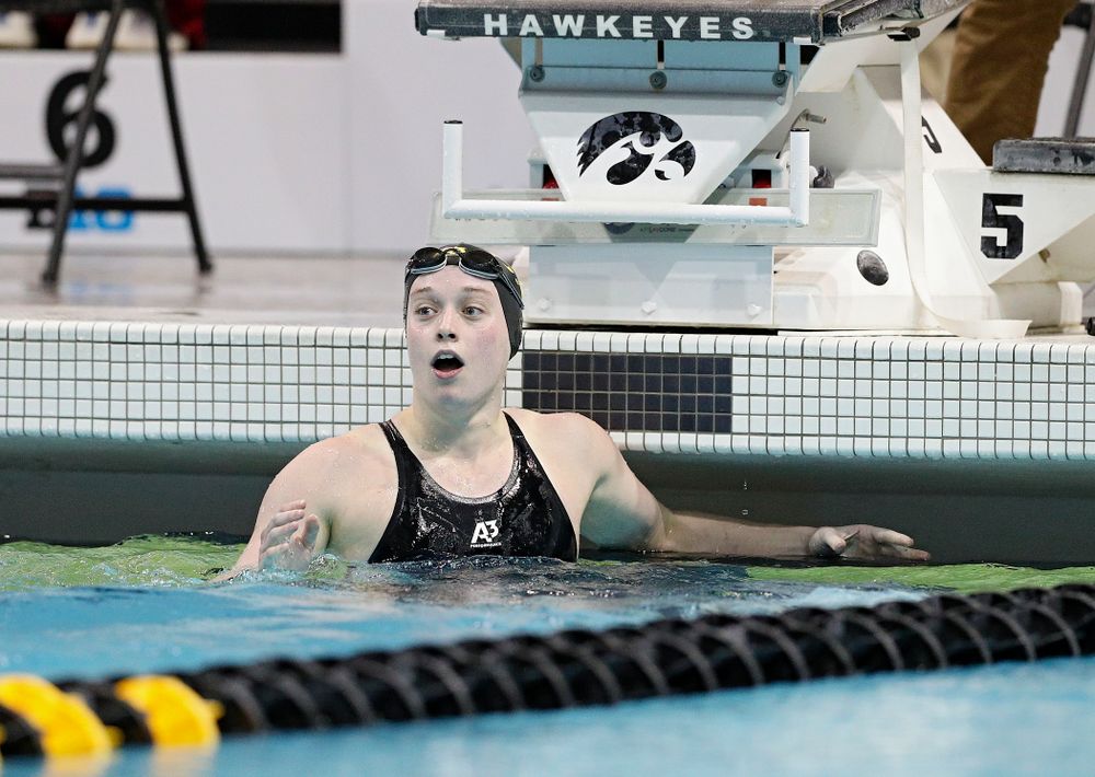 Iowa’s Kelsey Drake reacts as she looks a the video board and sees she broke a school record in a 200 yard butterfly time trial during the 2020 Big Ten Women’s Swimming and Diving Championships at the Campus Recreation and Wellness Center in Iowa City on Wednesday, February 19, 2020. (Stephen Mally/hawkeyesports.com)