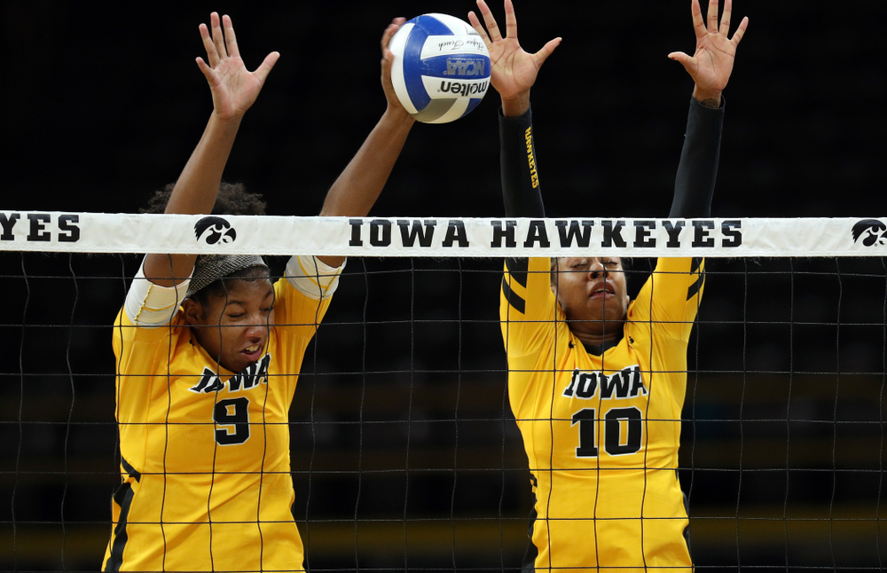 Iowa Hawkeyes middle blocker Amiya Jones (9) and outside hitter Griere Hughes (10) against the Rutgers Scarlet Knights Saturday, November 2, 2019 at Carver-Hawkeye Arena. (Brian Ray/hawkeyesports.com)