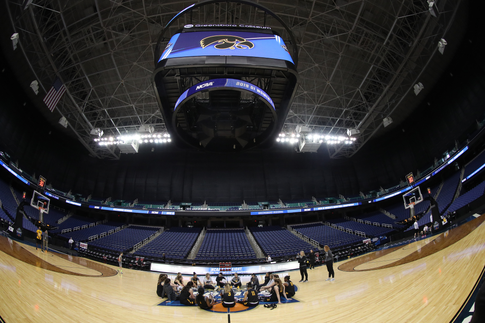 The Iowa Hawkeyes talk in their circle during shoot around before their regional final against the Baylor Lady Bears in the 2019 NCAA Women's College Basketball Tournament Monday, April 1, 2019 at Greensboro Coliseum in Greensboro, NC.(Brian Ray/hawkeyesports.com)
