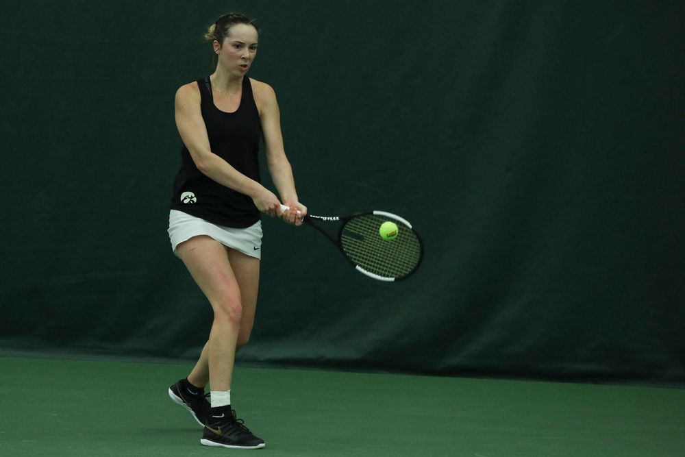 Iowa’s Samantha Mannix returns a hit during the Iowa women’s tennis meet vs DePaul on Friday, February 21, 2020 at the Hawkeye Tennis and Recreation Complex. (Lily Smith/hawkeyesports.com)