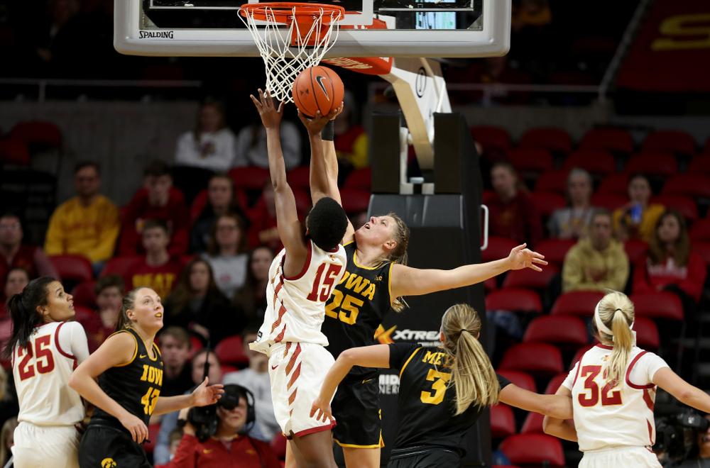 Iowa Hawkeyes forward/center Monika Czinano (25) blocks a shot against the Iowa State Cyclones Wednesday, December 11, 2019 at Hilton Coliseum in Ames, Iowa(Brian Ray/hawkeyesports.com)