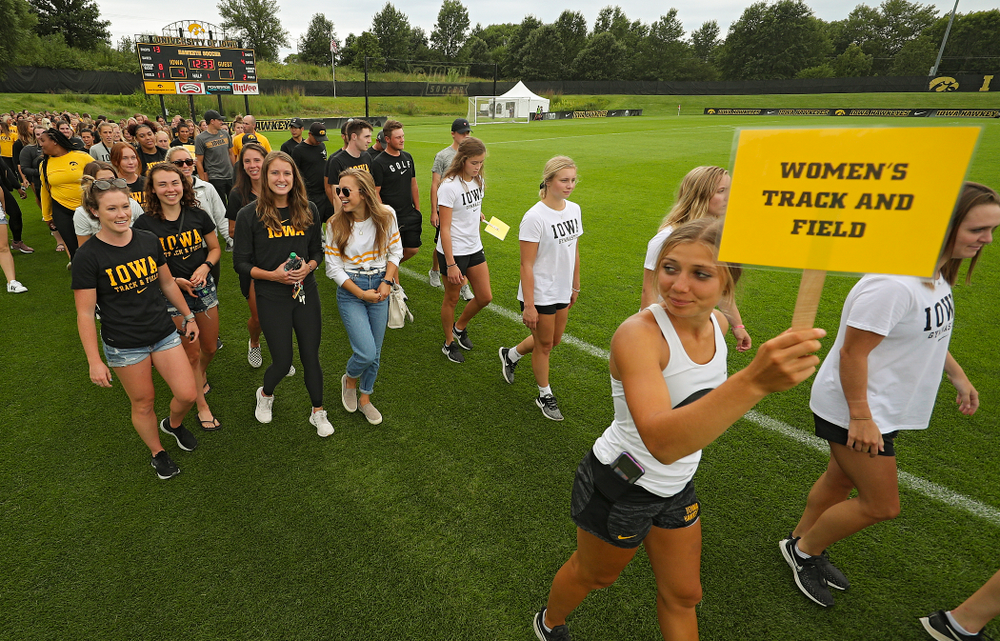 Student-athletes walk in the Parade of Champions during the Student-Athlete Kickoff at the Iowa Soccer Complex in Iowa City on Sunday, Aug 25, 2019. (Stephen Mally/hawkeyesports.com)