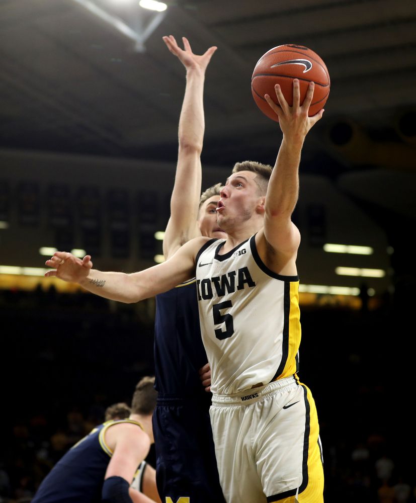 Iowa Hawkeyes guard CJ Fredrick (5) against the Michigan Wolverines Friday, January 17, 2020 at Carver-Hawkeye Arena. (Brian Ray/hawkeyesports.com)