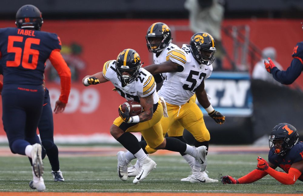 Iowa Hawkeyes defensive back Amani Hooker (27) and linebacker Amani Jones (52) against the Illinois Fighting Illini Saturday, November 17, 2018 at Memorial Stadium in Champaign, Ill. (Brian Ray/hawkeyesports.com)