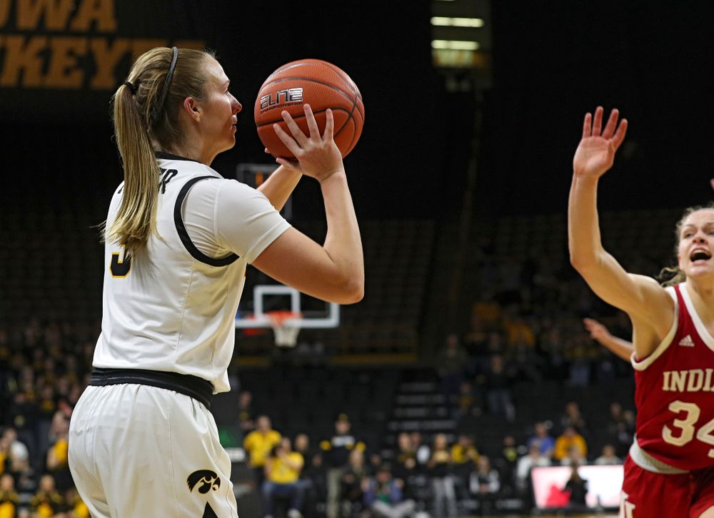 Iowa Hawkeyes guard Makenzie Meyer (3) makes a 3-pointer during the fourth quarter of their game at Carver-Hawkeye Arena in Iowa City on Sunday, January 12, 2020. (Stephen Mally/hawkeyesports.com)