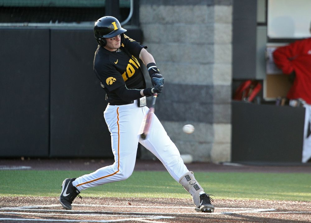 Iowa infielder Brendan Sher (2) drives a pitch during the second inning of their game at Duane Banks Field in Iowa City on Tuesday, March 3, 2020. (Stephen Mally/hawkeyesports.com)