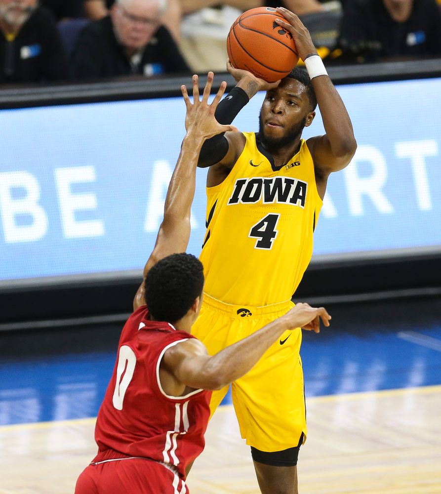 Iowa Hawkeyes guard Isaiah Moss (4) shoots the ball against Wisconsin on November 30, 2018 at Carver-Hawkeye Arena. (Tork Mason/hawkeyesports.com)
