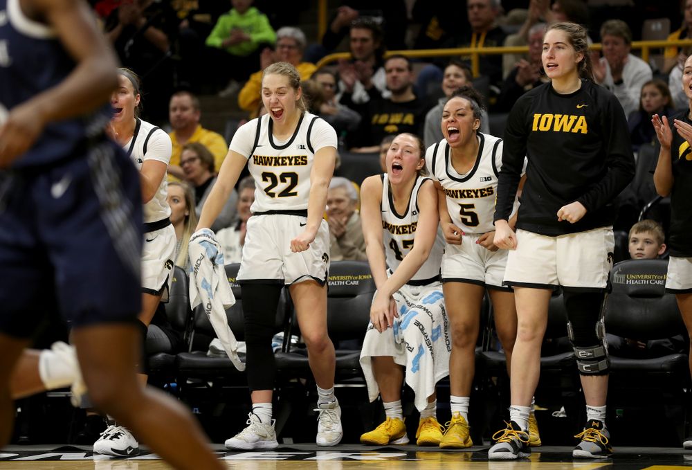 Iowa Hawkeyes guard Kathleen Doyle (22), forward Amanda Ollinger (43), guard Alexis Sevillian (5), and guard Kate Martin (20) against Penn State Saturday, February 22, 2020 at Carver-Hawkeye Arena. (Brian Ray/hawkeyesports.com)