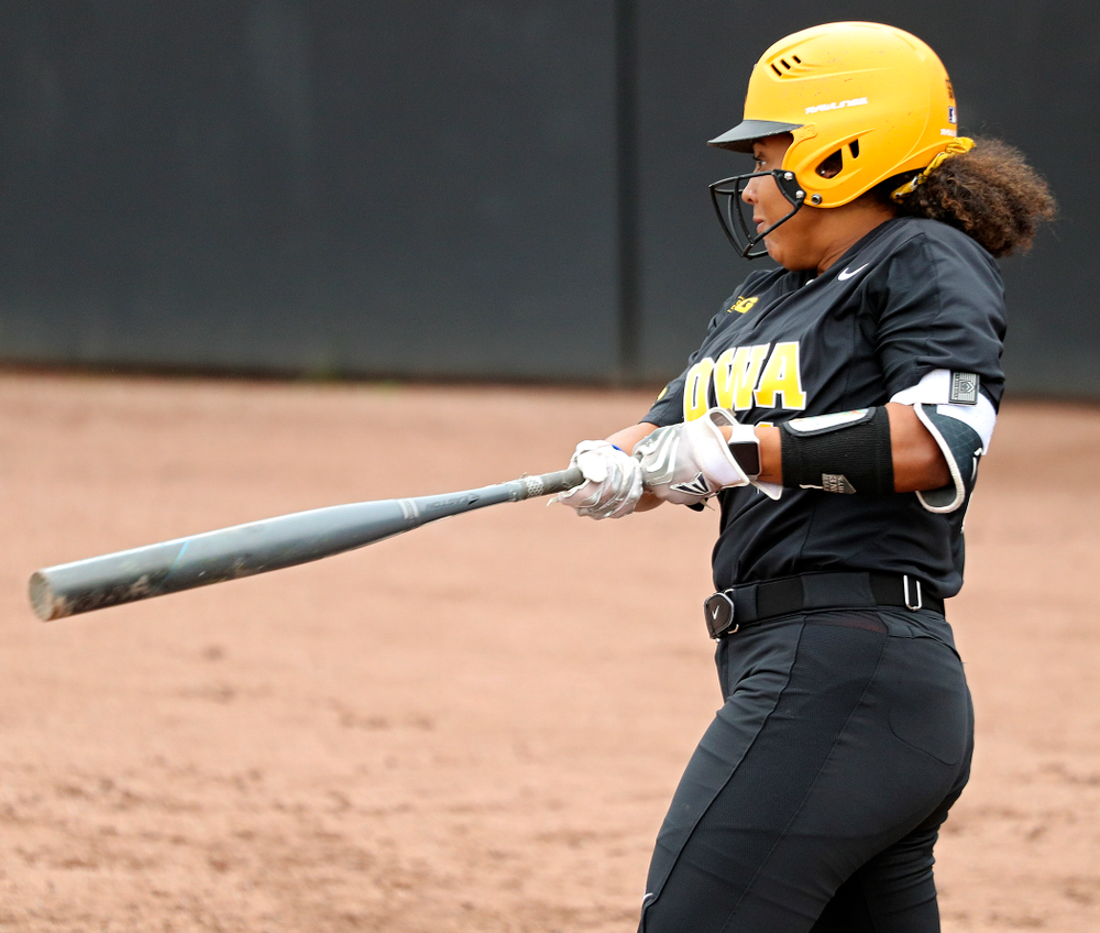Iowa infielder Avery Guy (11) bats during the fourth inning of their game against Iowa Softball vs Indian Hills Community College at Pearl Field in Iowa City on Sunday, Oct 6, 2019. (Stephen Mally/hawkeyesports.com)