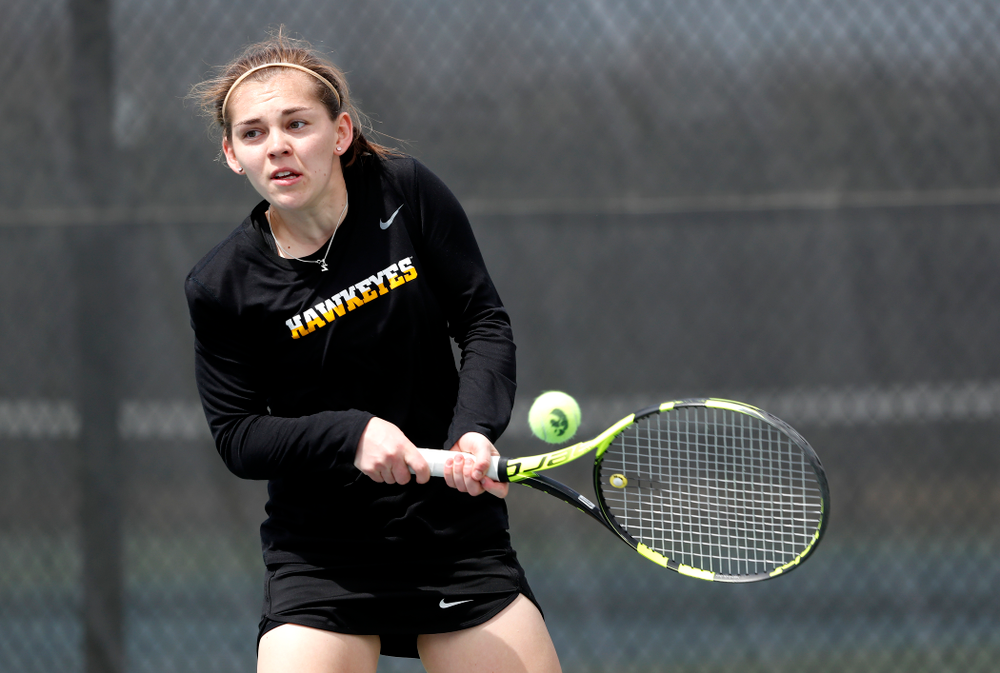 Iowa's Zoe Douglas against the Wisconsin Badgers Sunday, April 22, 2018 at the Hawkeye Tennis and Recreation Center. (Brian Ray/hawkeyesports.com)