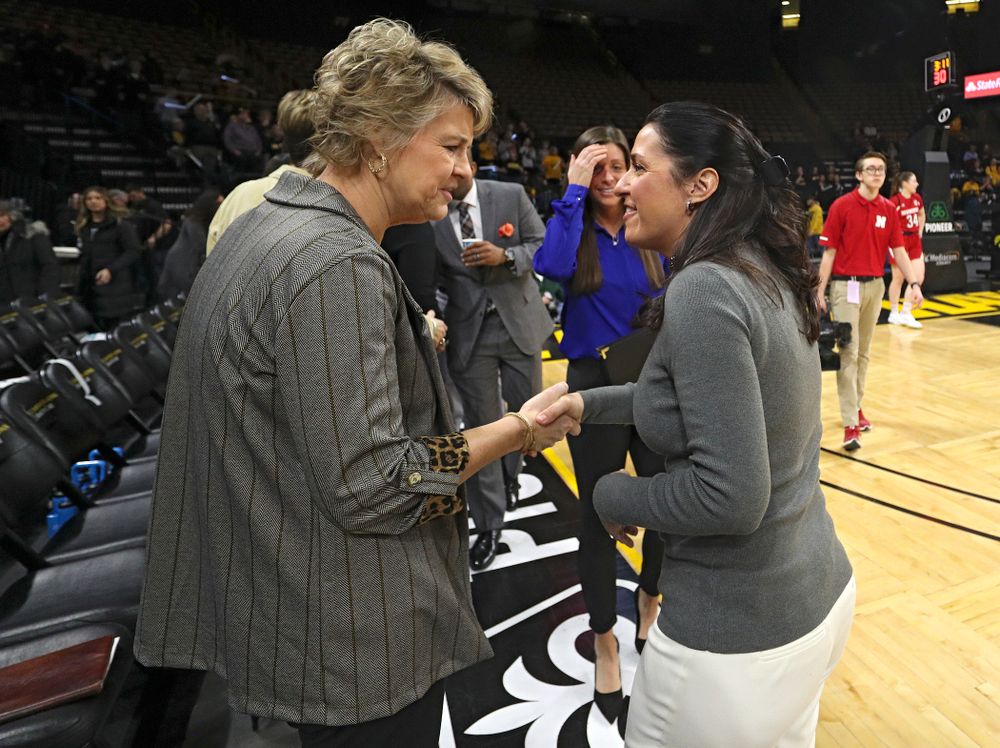 Iowa Hawkeyes head coach Lisa Bluder talks with Nebraska Cornhuskers head coach Amy William before the game at Carver-Hawkeye Arena in Iowa City on Thursday, February 6, 2020. (Stephen Mally/hawkeyesports.com)