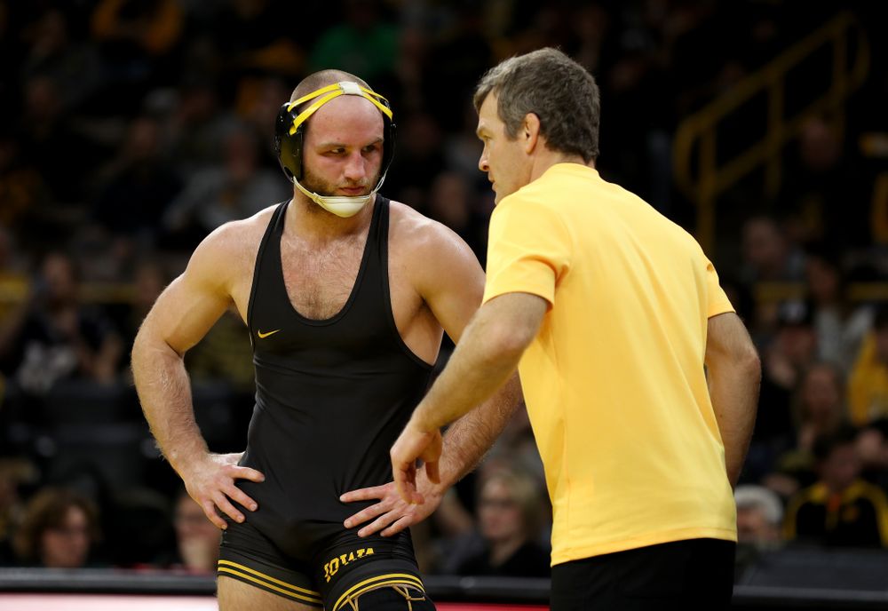 IowaÕs Alex Marinelli wrestles WisconsinÕs Evan Wick at 165 pounds Sunday, December 1, 2019 at Carver-Hawkeye Arena. Marinelli won the match 4-2. (Brian Ray/hawkeyesports.com)