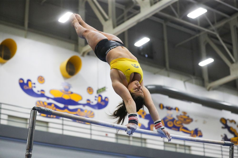 Erin Castle performs on the uneven bars during the Iowa women’s gymnastics Black and Gold Intraquad Meet on Saturday, December 7, 2019 at the UI Field House. (Lily Smith/hawkeyesports.com)