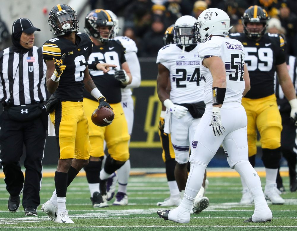 Iowa Hawkeyes wide receiver Ihmir Smith-Marsette (6) signals for a first down after making a reception during a game against Northwestern at Kinnick Stadium on November 10, 2018. (Tork Mason/hawkeyesports.com)